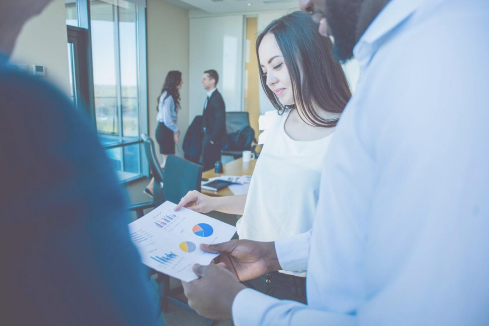 Budget planning session showing scenario analysis and cash flow projections